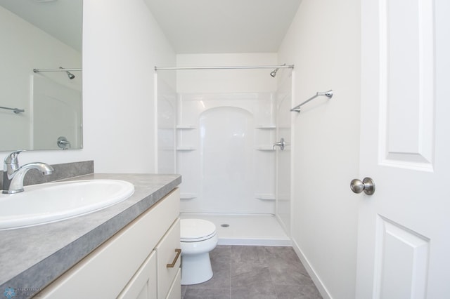 full bath with toilet, a shower, and vanity