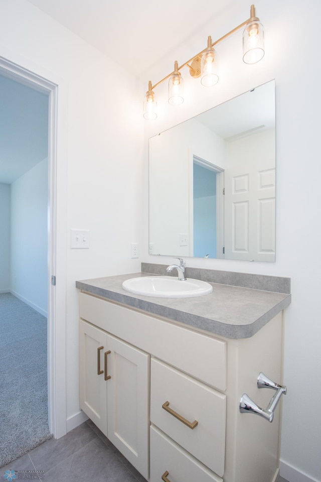 bathroom with vanity and tile patterned flooring