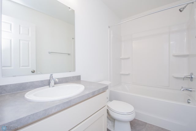 full bathroom with vanity, tile patterned flooring, bathing tub / shower combination, and toilet