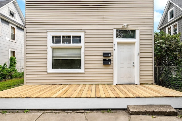 doorway to property with a deck