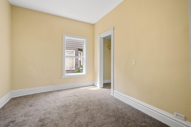 unfurnished room featuring carpet floors