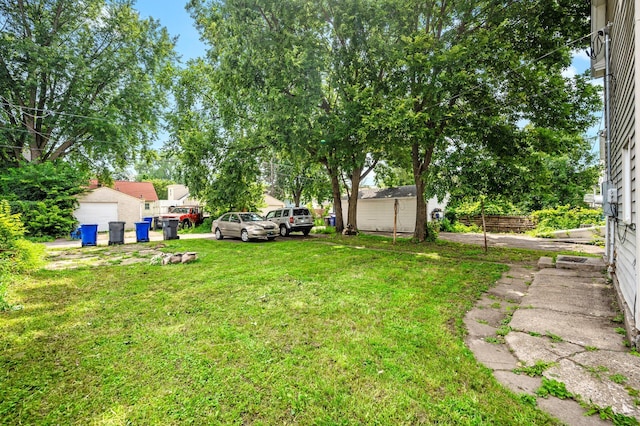 view of yard featuring a storage unit