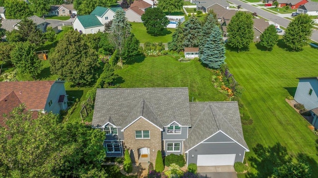 drone / aerial view with a residential view