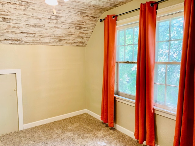 bonus room with carpet, vaulted ceiling, and wooden ceiling