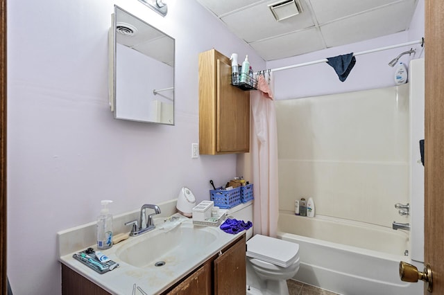 full bathroom featuring vanity, toilet, shower / bathtub combination with curtain, and tile patterned floors