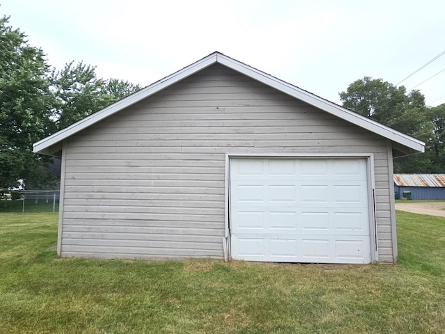 garage with a lawn