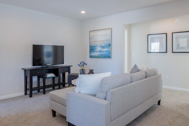 living room with light carpet, baseboards, and recessed lighting