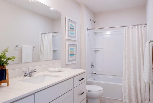 bathroom with toilet, vanity, and shower / bathtub combination with curtain