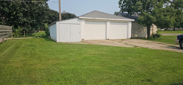 garage with a lawn