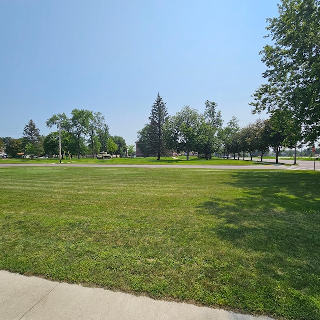 surrounding community with a lawn