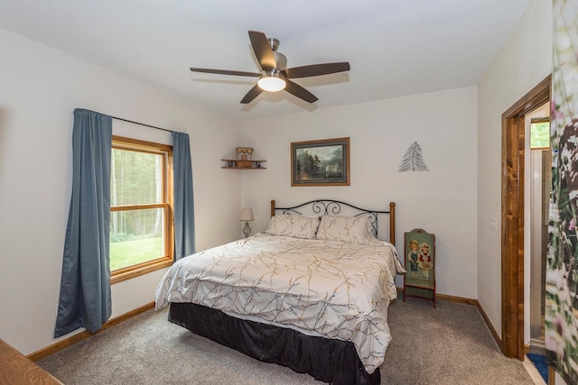 bedroom featuring ceiling fan and carpet floors