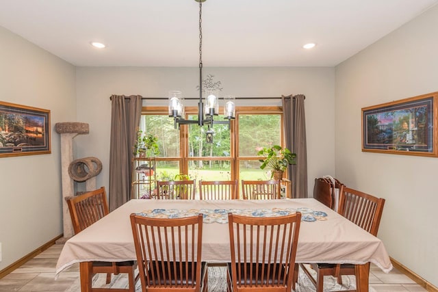 dining room featuring a chandelier