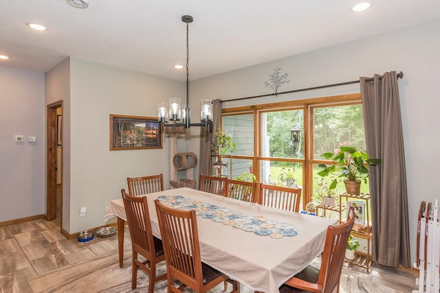 dining space with a notable chandelier