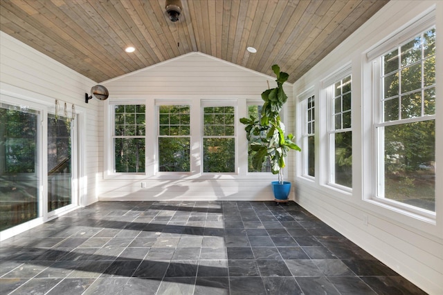 unfurnished sunroom featuring lofted ceiling and wood ceiling