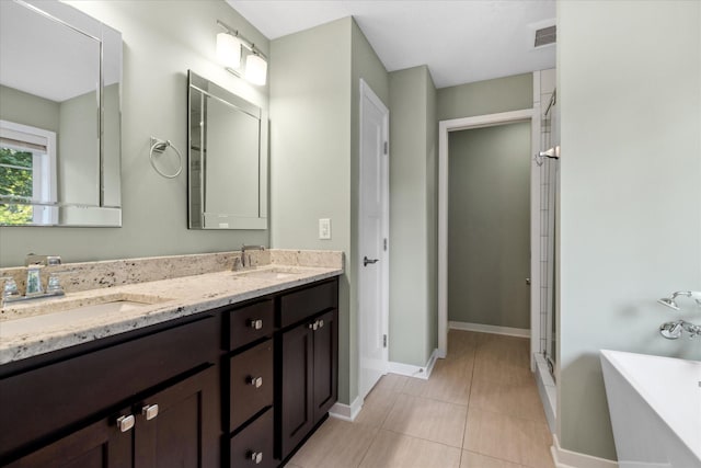 bathroom featuring tile patterned flooring, vanity, and independent shower and bath