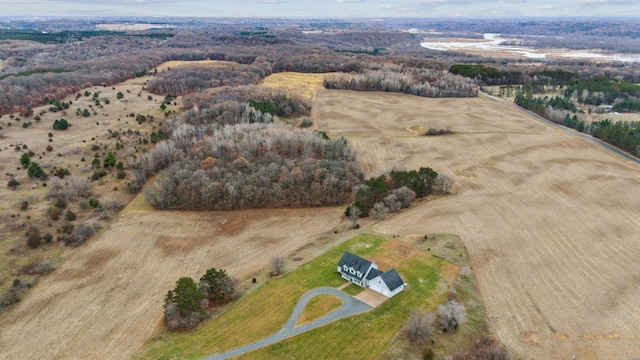 birds eye view of property with a rural view