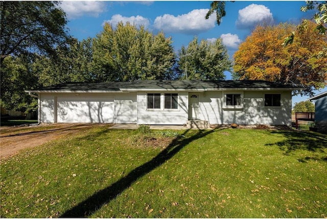 single story home with a garage and a front yard