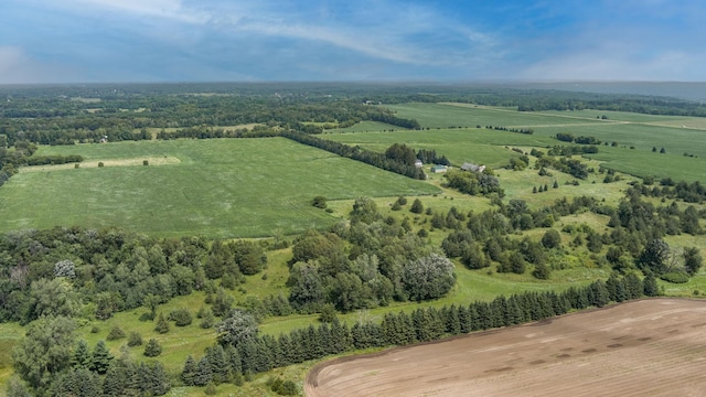 birds eye view of property featuring a rural view