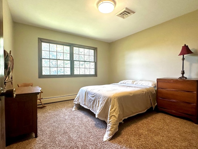 bedroom with light carpet, a baseboard radiator, visible vents, and baseboards