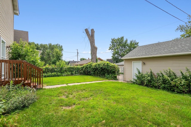 view of yard featuring a deck