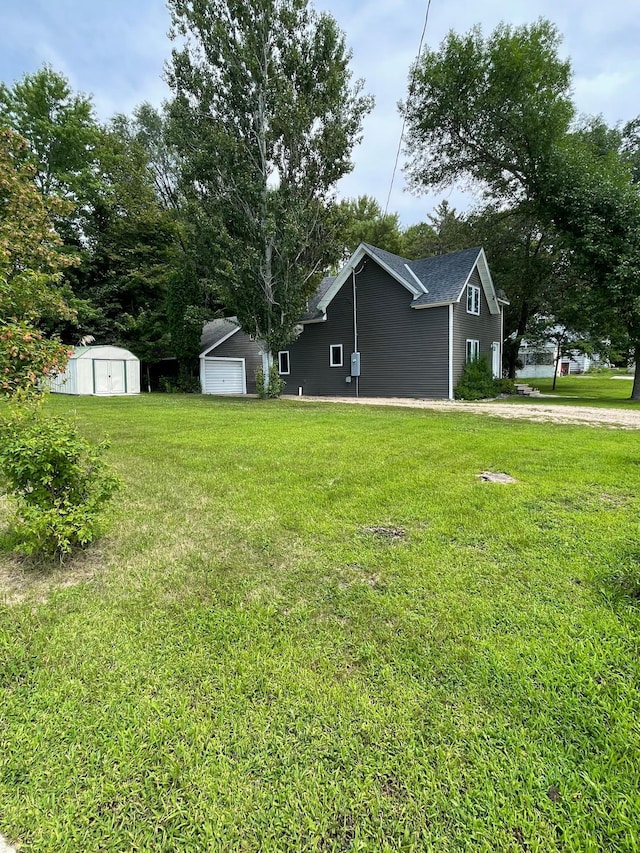 view of yard with a storage unit