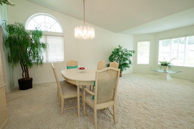 dining area with light carpet and plenty of natural light