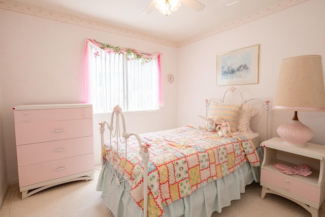 bedroom with light carpet and ceiling fan