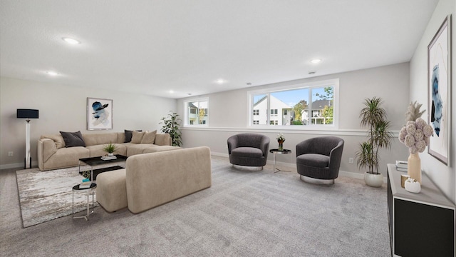 living room featuring light colored carpet