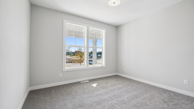 view of carpeted spare room