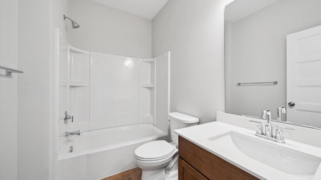 full bathroom with toilet, shower / bathing tub combination, and vanity