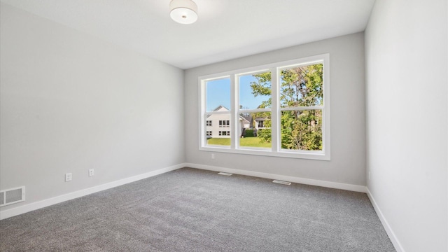 empty room with carpet floors