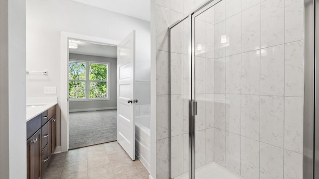 bathroom featuring plus walk in shower and vanity