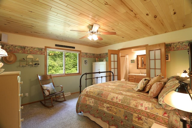 bedroom with wood ceiling, a ceiling fan, baseboards, and carpet