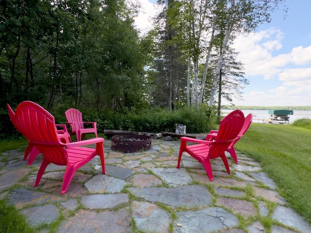 view of patio / terrace featuring a fire pit