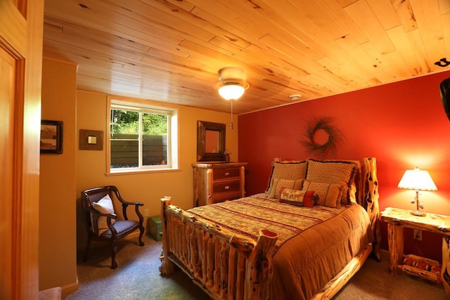 bedroom featuring carpet and wooden ceiling