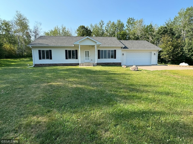 ranch-style home with a front yard and a garage