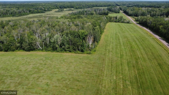 birds eye view of property featuring a rural view