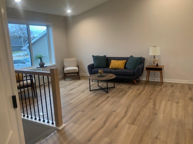 living room with light hardwood / wood-style floors