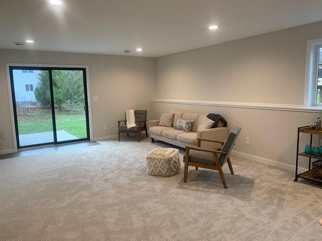 living room featuring light colored carpet