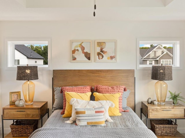 bedroom featuring multiple windows