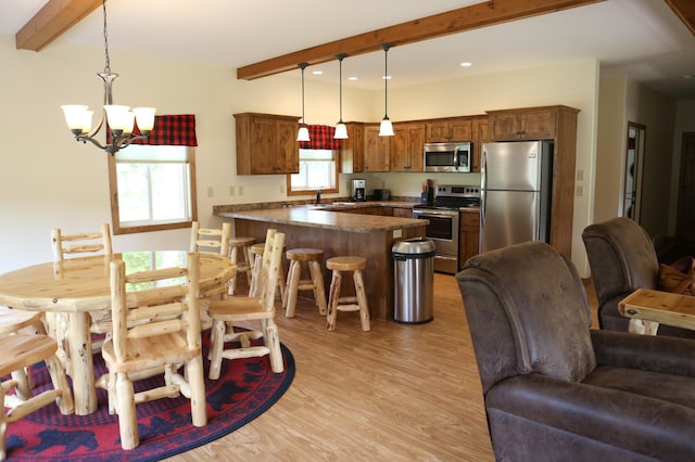 interior space featuring light hardwood / wood-style floors, sink, an inviting chandelier, and beam ceiling