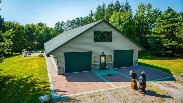 exterior space with a detached garage