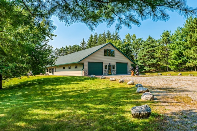 view of front of house featuring stone siding and a front lawn