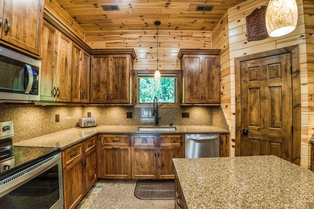 kitchen with a sink, tasteful backsplash, appliances with stainless steel finishes, stone counters, and wood ceiling