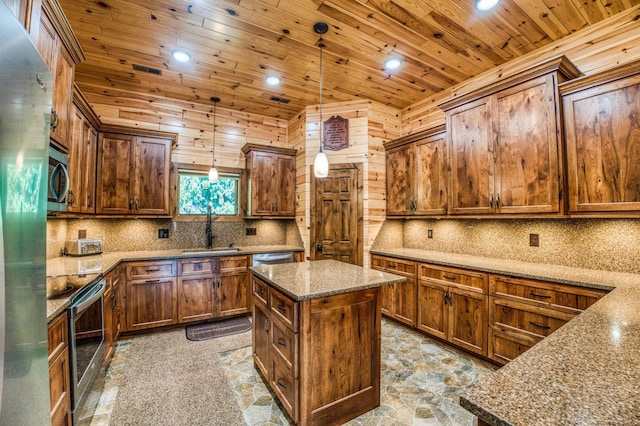 kitchen with a sink, stone finish flooring, stainless steel appliances, decorative backsplash, and wood ceiling