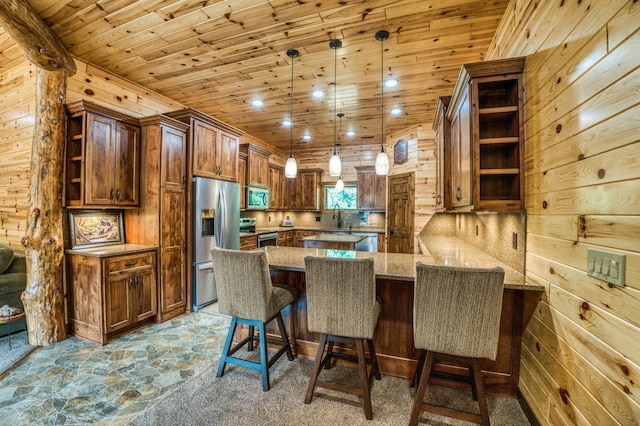 kitchen featuring stone finish flooring, wooden ceiling, appliances with stainless steel finishes, a peninsula, and open shelves