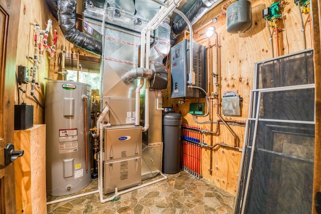 utility room featuring electric water heater