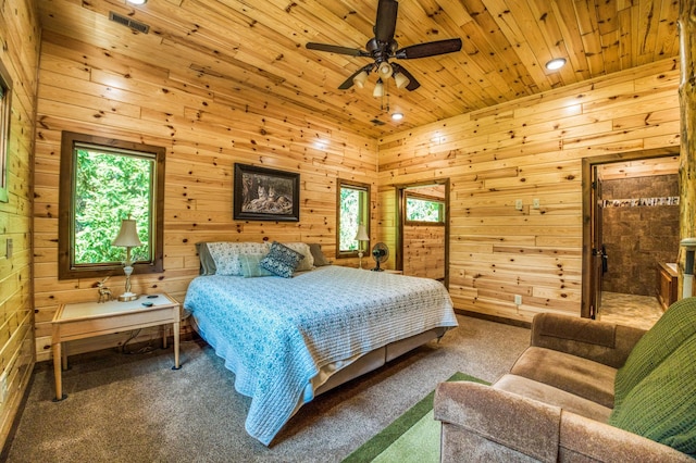 carpeted bedroom featuring wooden ceiling, wooden walls, and recessed lighting