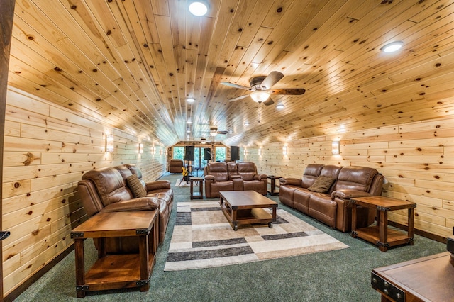 carpeted living room featuring wood ceiling, wood walls, a ceiling fan, and vaulted ceiling