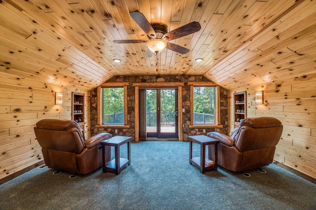 living area featuring carpet flooring, wood walls, wooden ceiling, and lofted ceiling